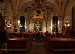 Arosorkestern under repetion infr adventskonsert i Vrfrukyrkan, Enkping den 28 november 2009.